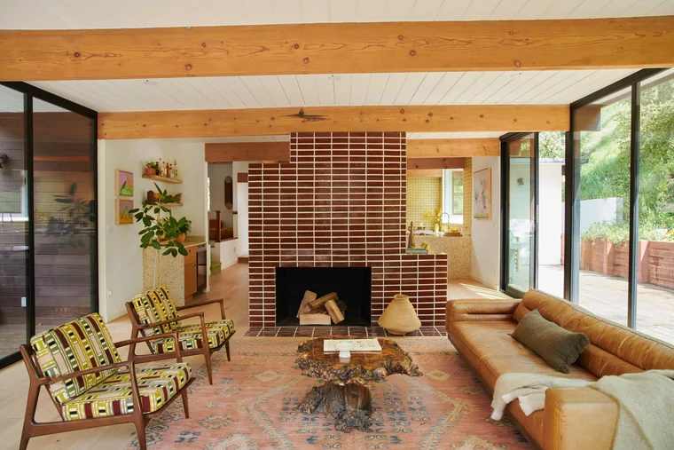Mid-century Westside living room with brick fireplace — 10 Good Things May 2026 newsletter by Alex Hoerner